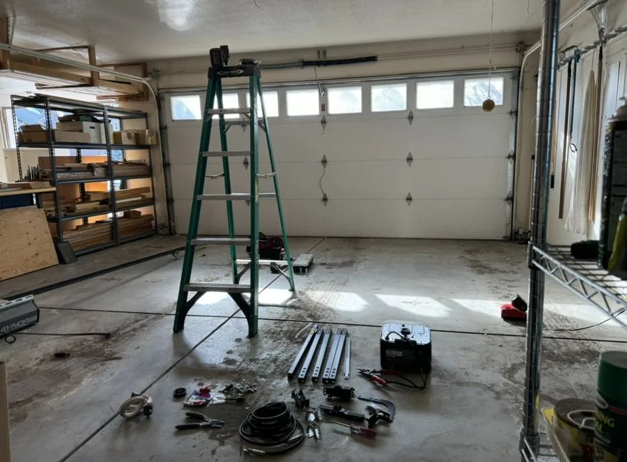 Two-car garage door installation in progress