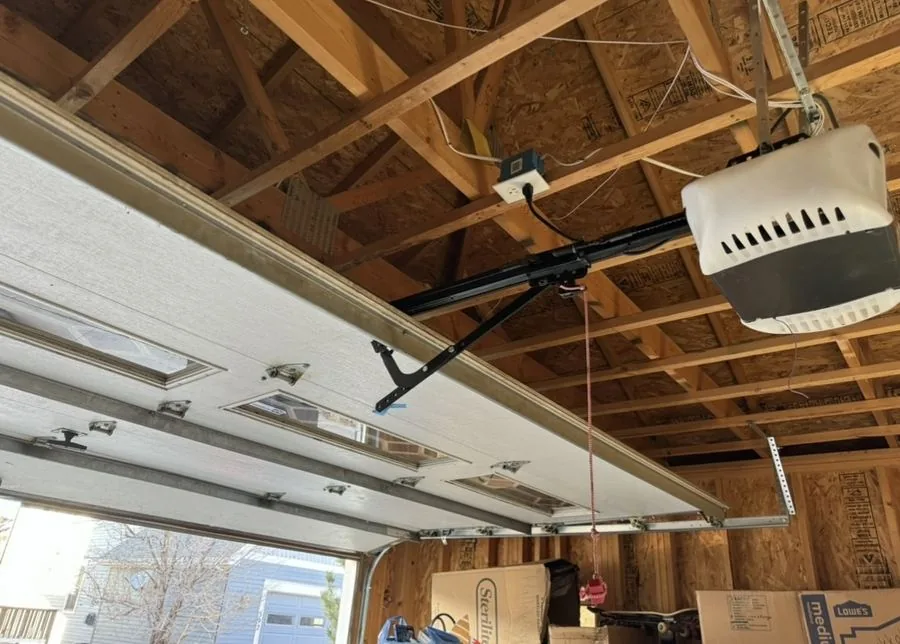 Ceiling-mounted garage door opener